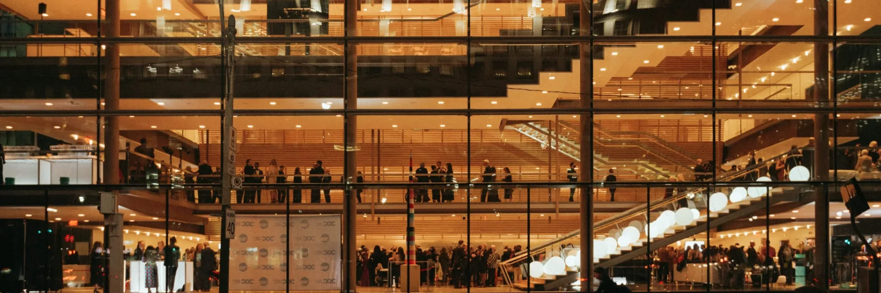 An evening reception inside the Four Seasons Centre's glass City Room